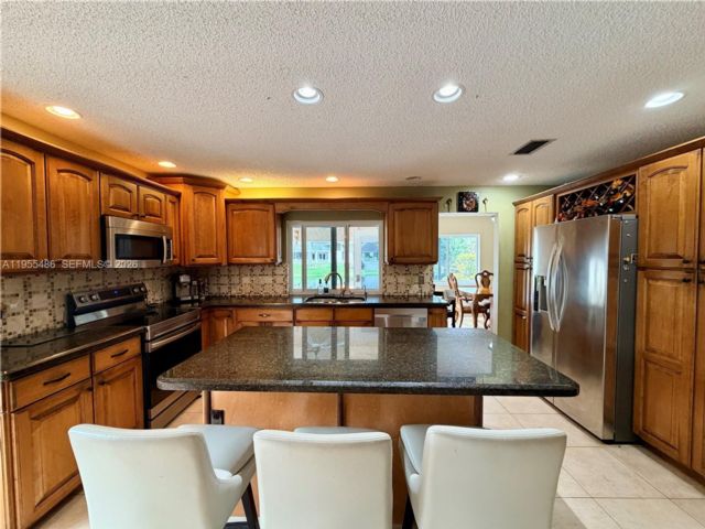 4 BR,  4.00 BTH &nbsp; style home in Cooper City