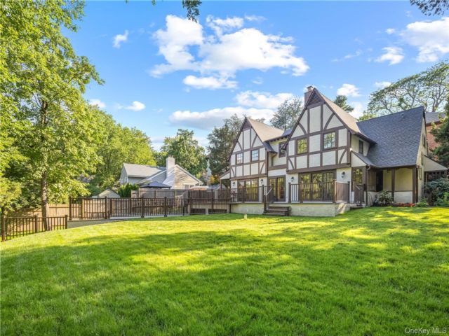  5 BR,  4.00 BTH &nbsp;Tudor style home in Douglaston