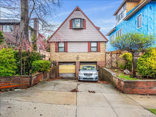  5 BR,  3.00 BTH &nbsp;A-frame style home in Hollis Hills