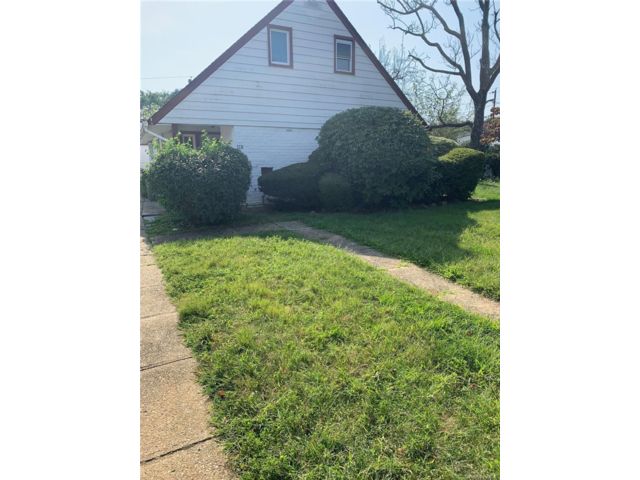  3 BR,  2.00 BTH &nbsp;A-frame style home in East Meadow