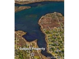 Lot <b>Size:</b>  &nbsp;House style home in Mastic Beach
