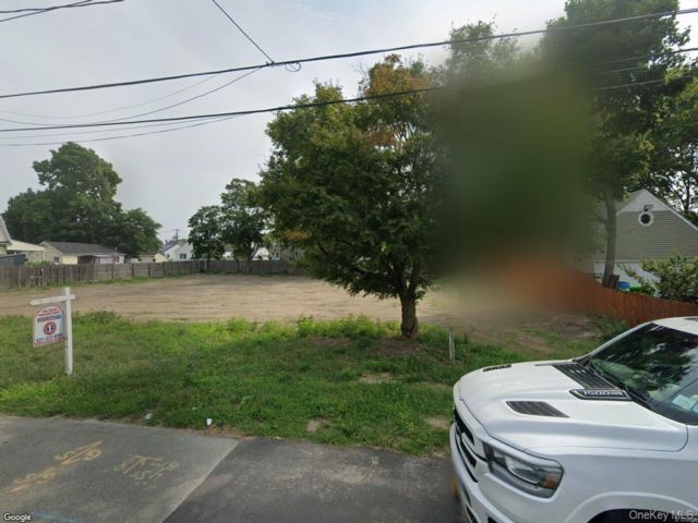 Lot <b>Size:</b>  &nbsp;House style home in Patchogue