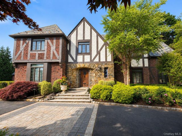  5 BR,  5.00 BTH &nbsp;Tudor style home in Woodsburgh