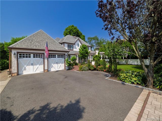  5 BR,  4.00 BTH &nbsp;Tudor style home in Rockville Centre