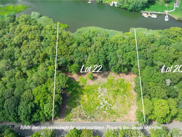 Lot <b>Size:</b>  &nbsp;House style home in East Moriches
