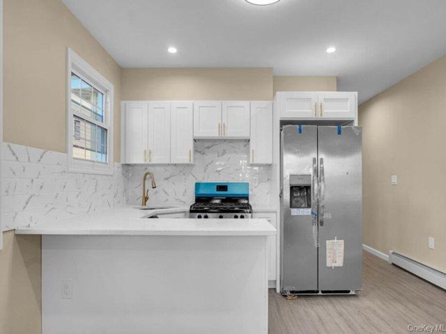  2 BR,  2.00 BTH &nbsp;A-frame style home in Queens Village